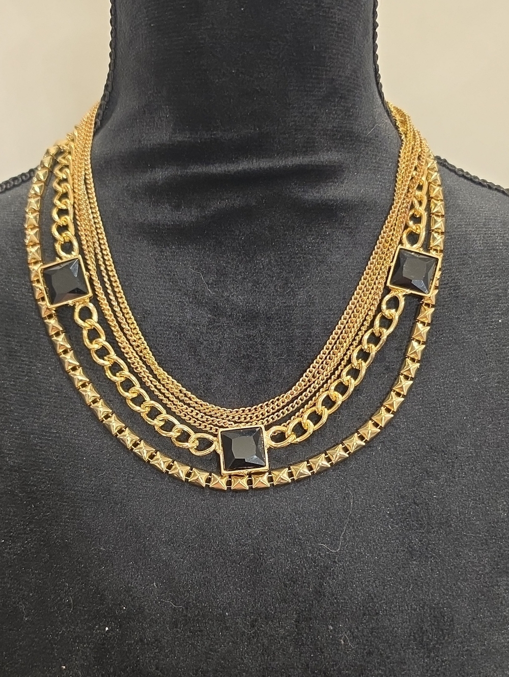 Gold Multi-Row Chain Necklace with Black Stone Accents